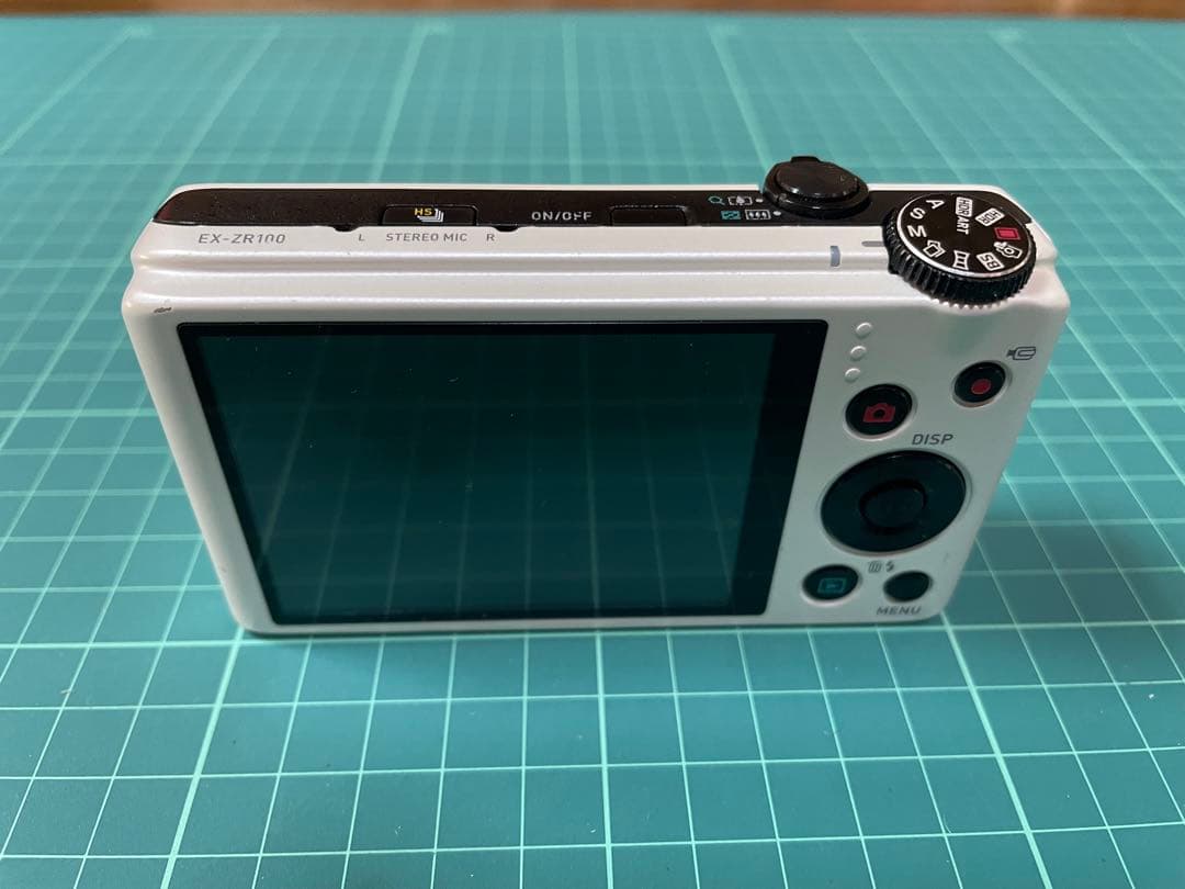 CASIO EXILIM EX-ZR100 ホワイト [電池挿入ふたロック不良]