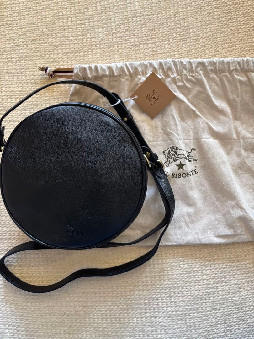 IL BISONTE 黒 レザー 円形バッグ 保存袋付き