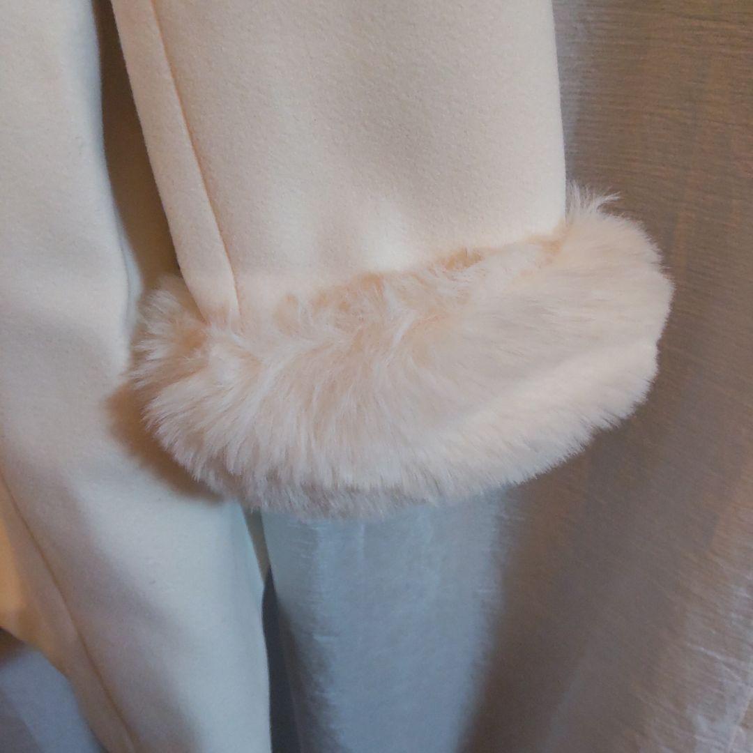 アンミールリボン付きノーカラーフレアコートホワイト