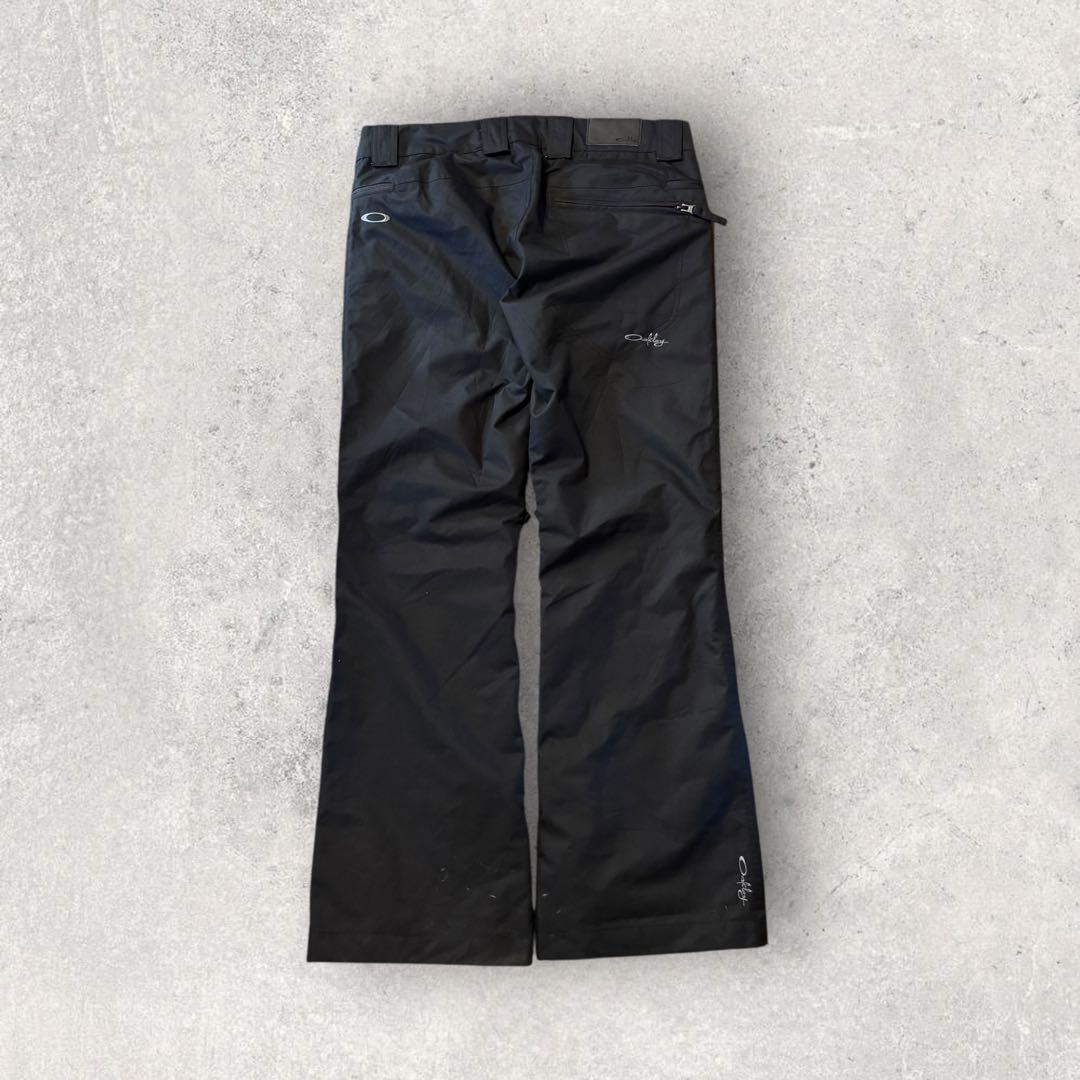 【オークリー】スキー　スノボーパンツ　M 黒　刺繍ロゴ　11年製　希少品　k