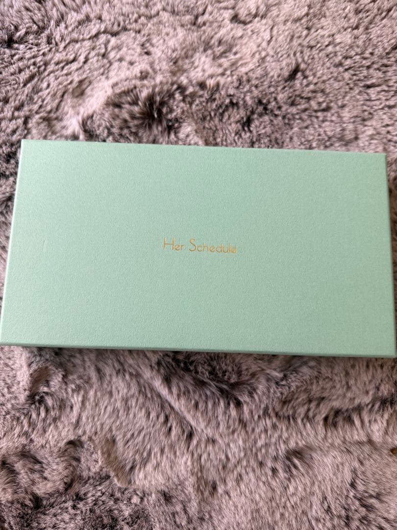 HerSchedule クリーミーモンブラン」チェレットパイソン長財布　L字