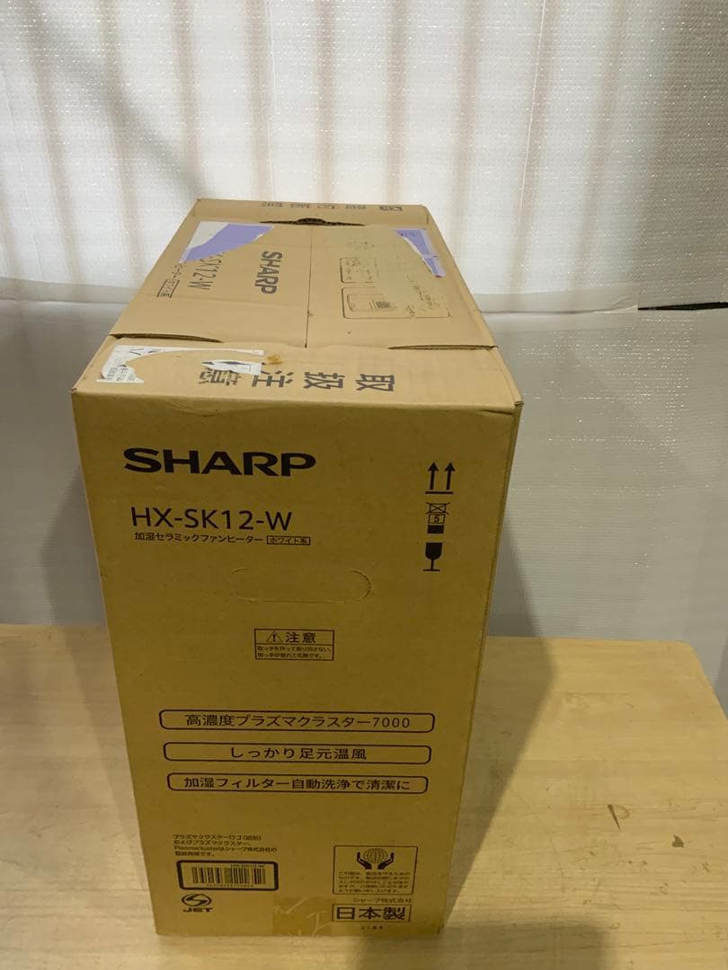 新品未使用箱不良　シャープ 加湿セラミックファンヒーター HX-SK12-W