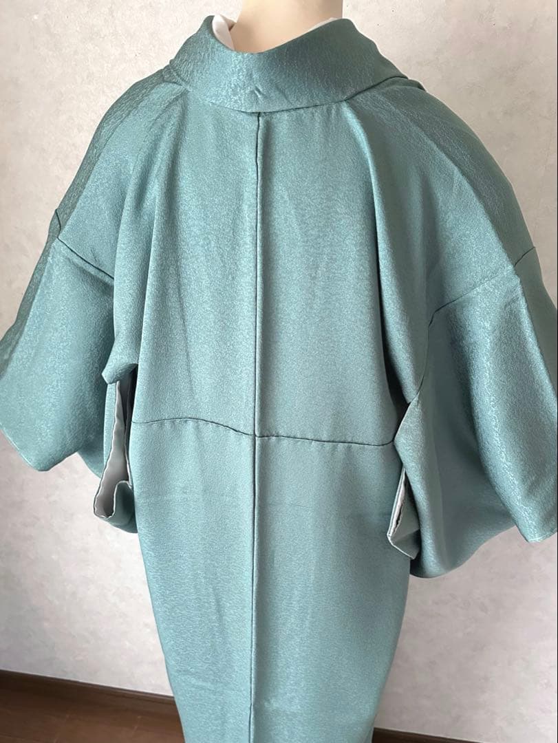 a09【在庫処分・特価】未使用 青緑 織柄 正絹 色無地 裄 64.5