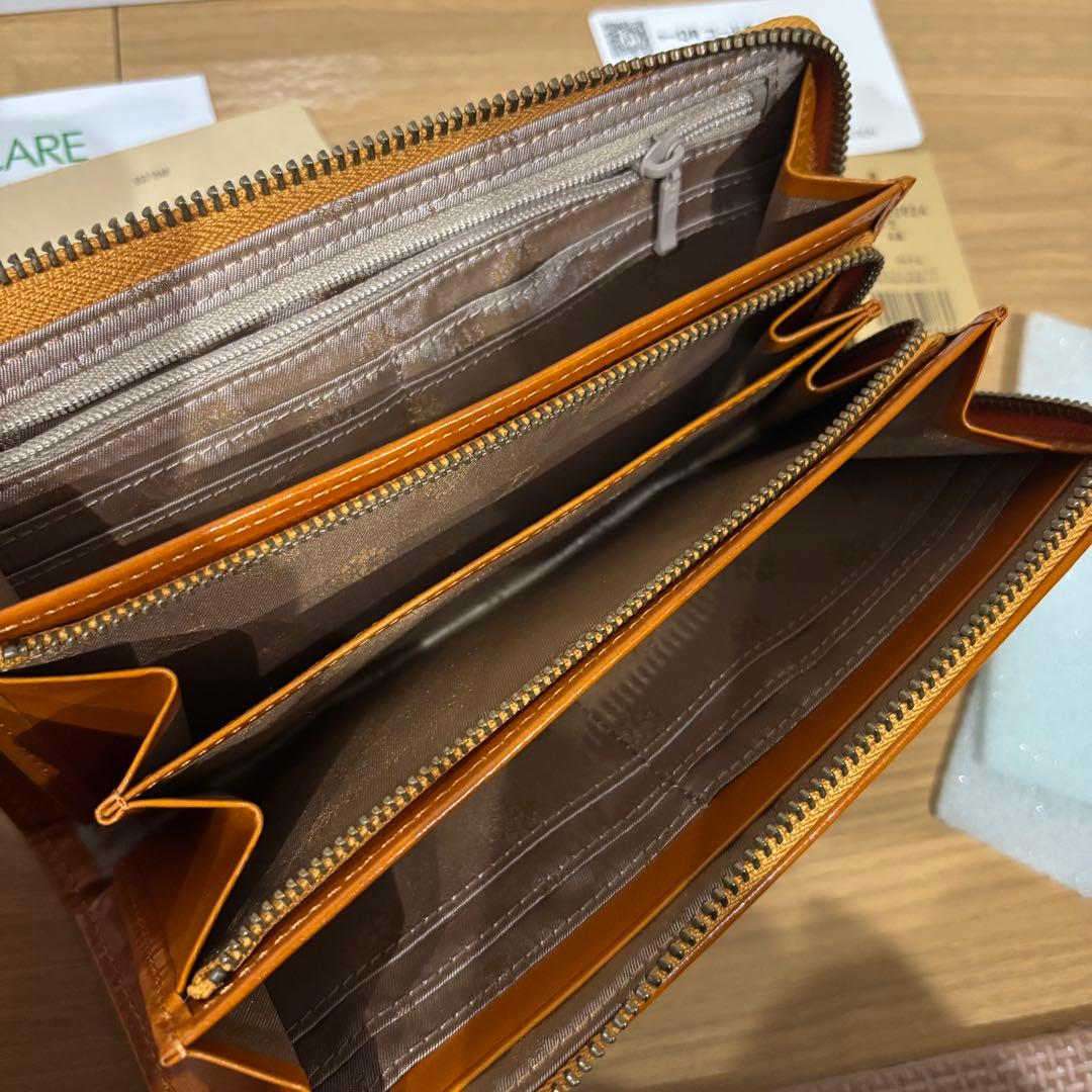 ☆新品未使用＊ダコタ＊革＊長財布＊編み込みデザイン＊早い者勝ち！