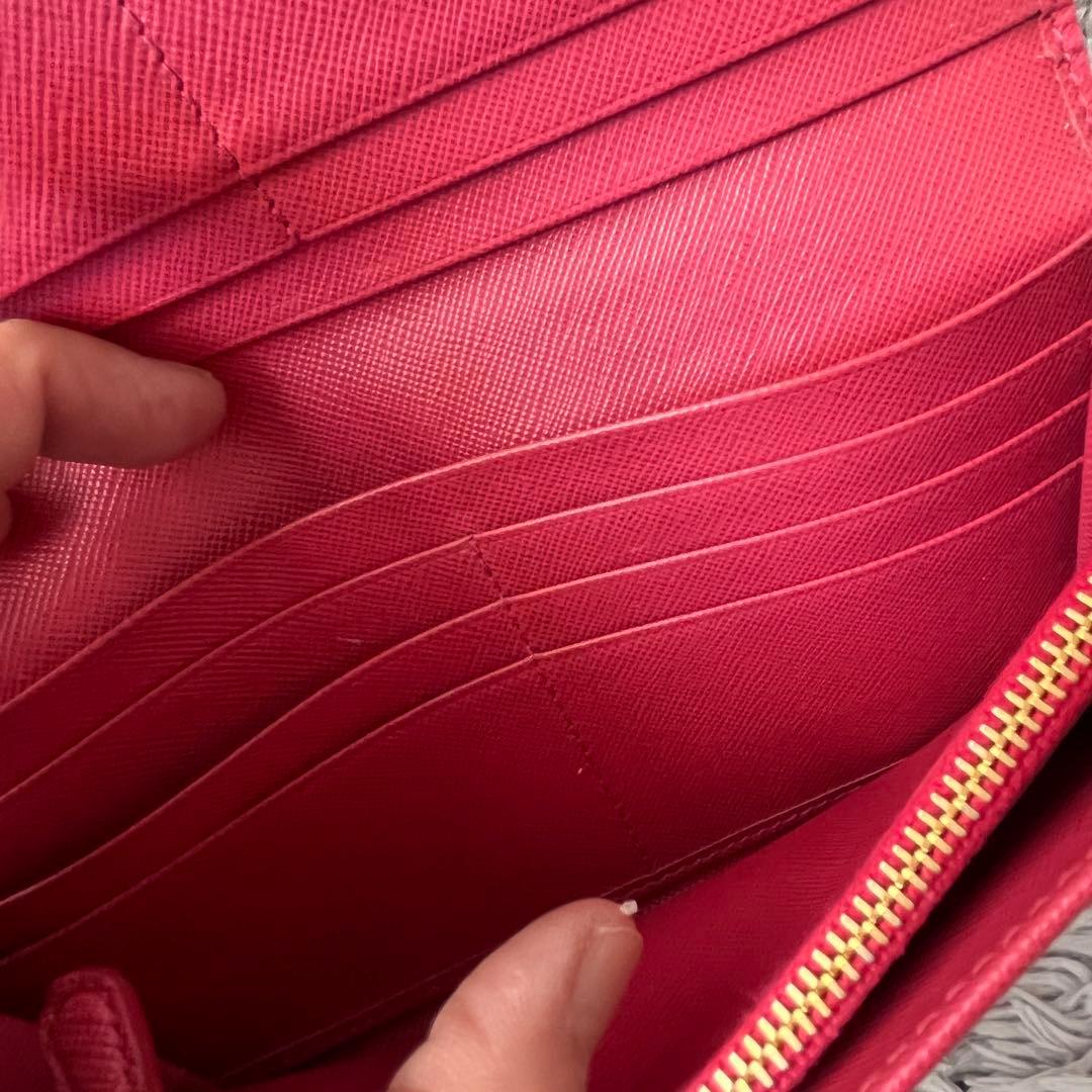 良品✨PRADA フィオッコ　サフィアーノ　メタルロゴ　リボン　ピンク　長財布