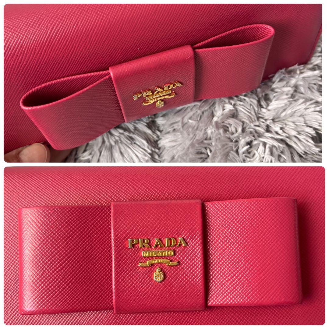 良品✨PRADA フィオッコ　サフィアーノ　メタルロゴ　リボン　ピンク　長財布