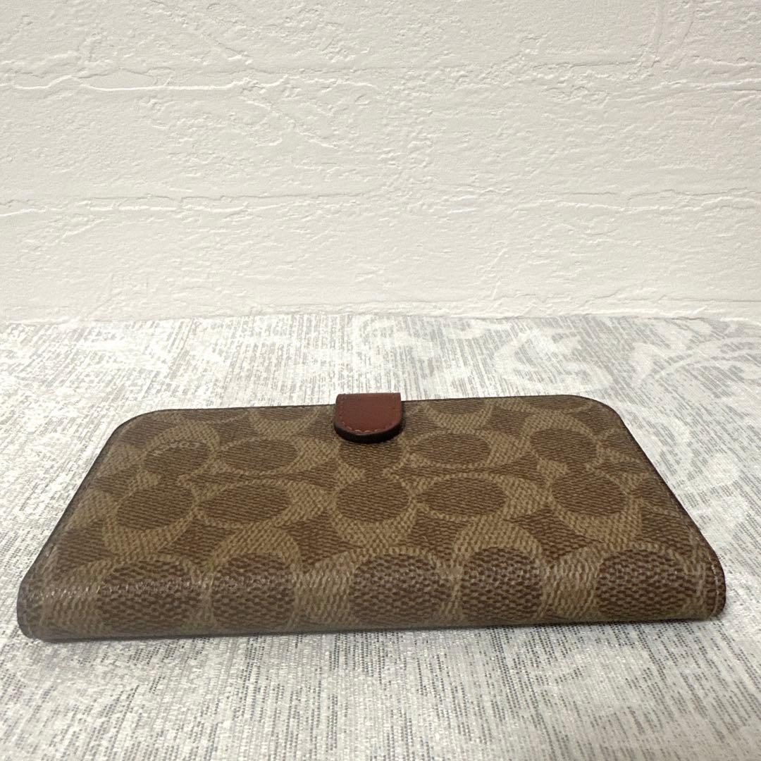 極美品 COACH 手帳型 iPhone13 スマホケース 茶 シグネチャー