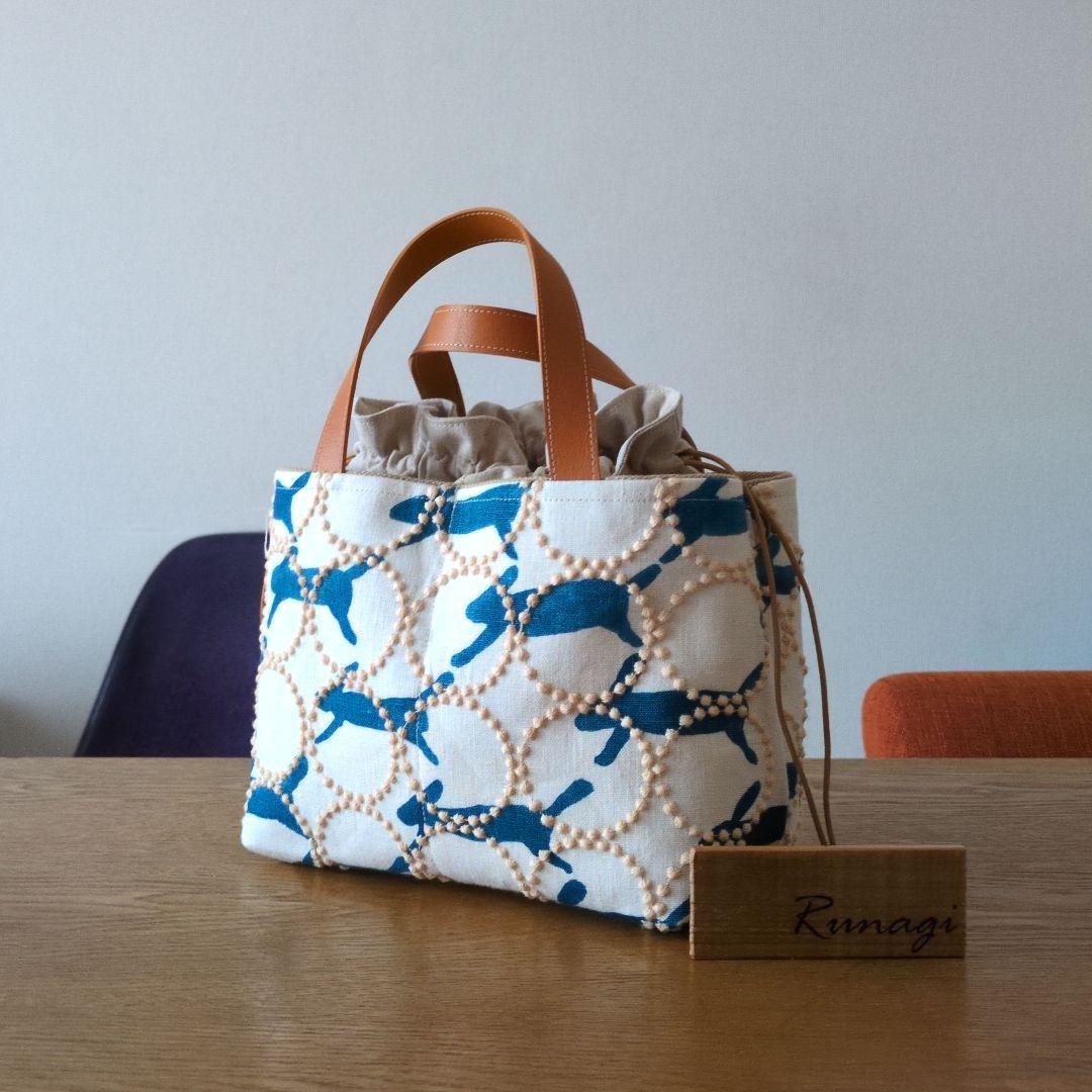 【1561】あおりポケットの巾着バッグ＊ミナペルホネン