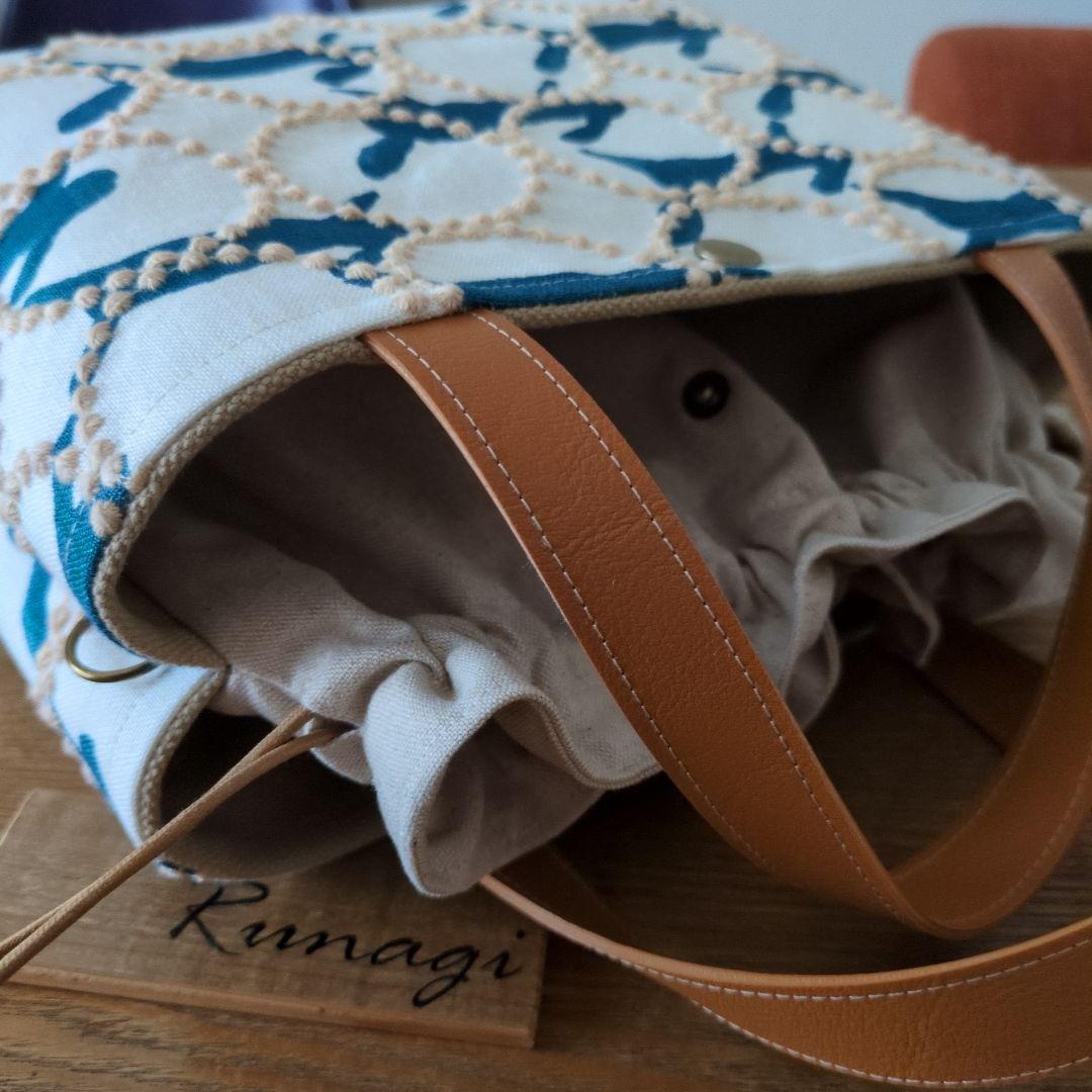 【1561】あおりポケットの巾着バッグ＊ミナペルホネン