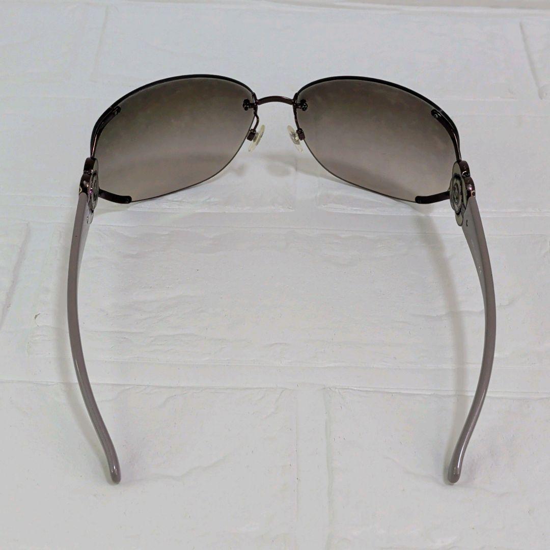 良品✨️　CHANEL　サングラス　リムレス　ココマークカメリア　ラインストーン