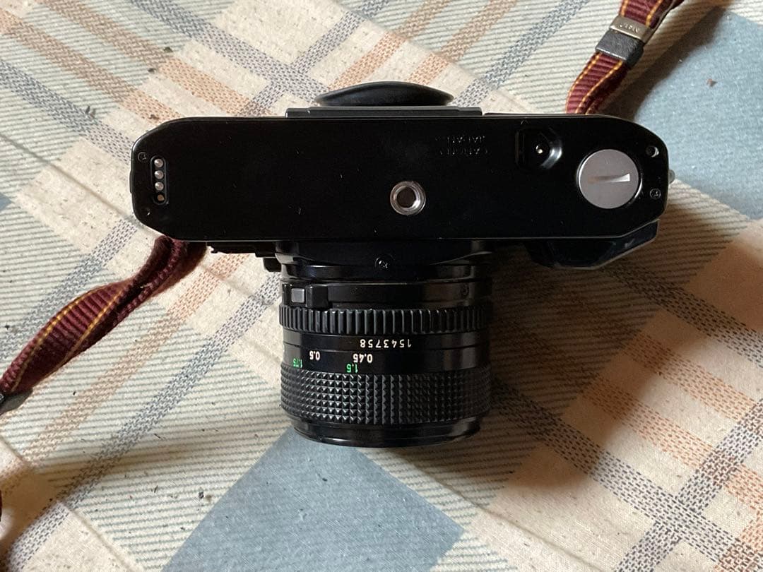 Canon A-1。　814000。カバー無し、レンズキャップ無し、取扱書無し。