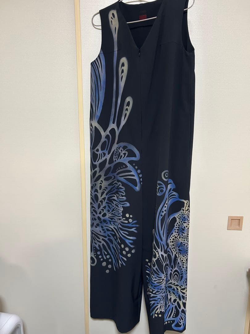 新品タグ付⭐︎ YOKANG Vネックオールインワン　pokkeアイランド柄