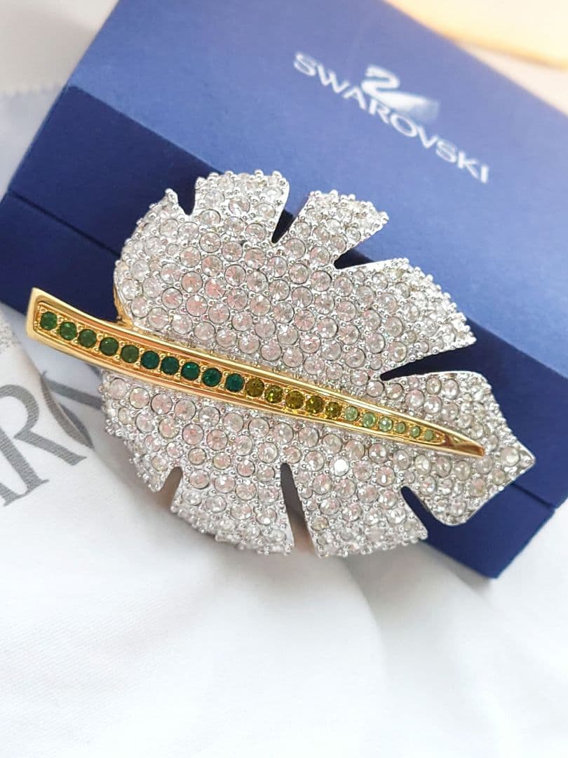SWAROVSKI 大ぶりリーフ ブロー パヴェ ゴールド カラー