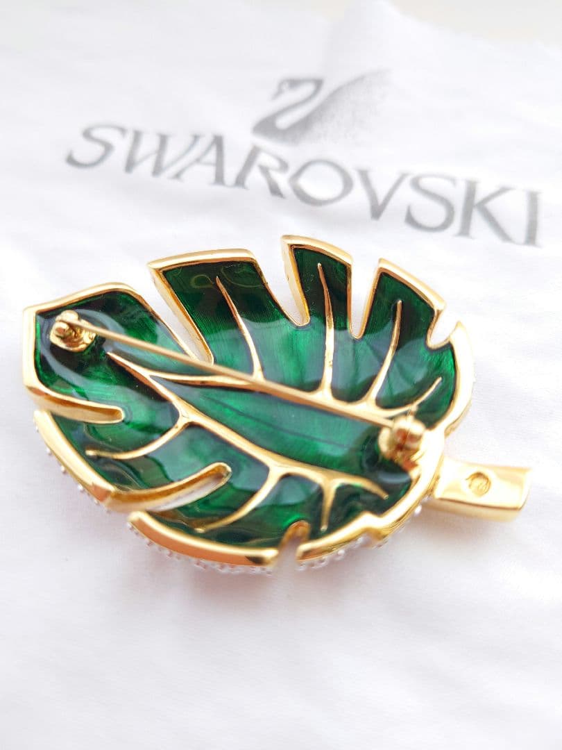 SWAROVSKI 大ぶりリーフ ブロー パヴェ ゴールド カラー