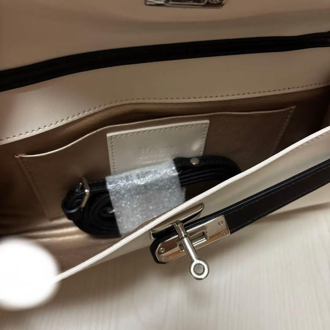 Whim Gazette バイカラークラッチバッグ