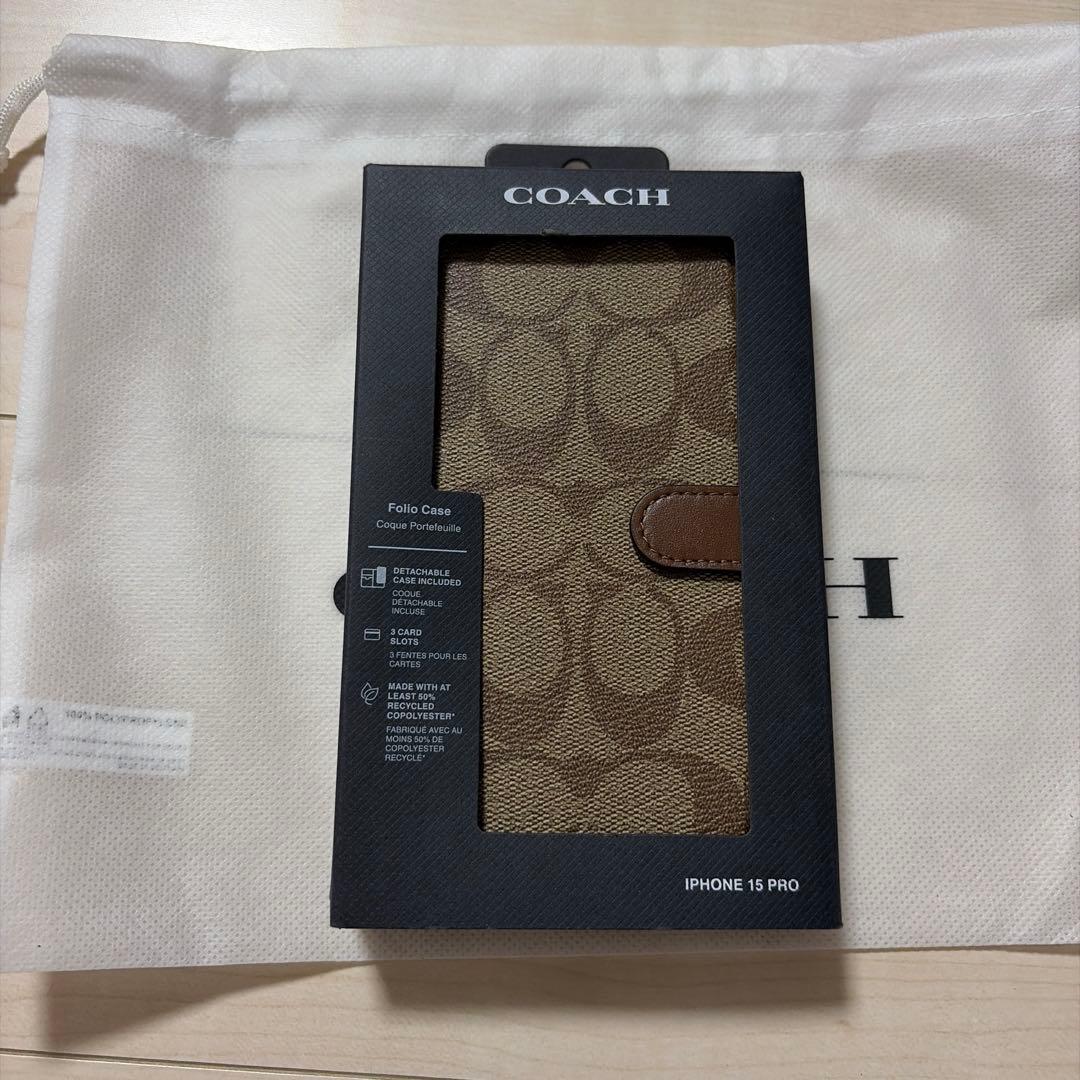 コーチiPhone15 PRO ケース シグネチャー 手帳型 スマホケース 収納