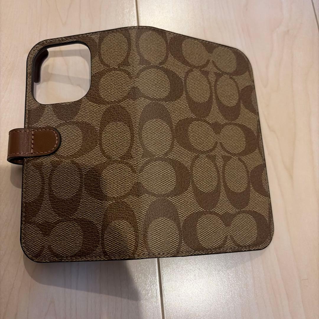 コーチiPhone15 PRO ケース シグネチャー 手帳型 スマホケース 収納