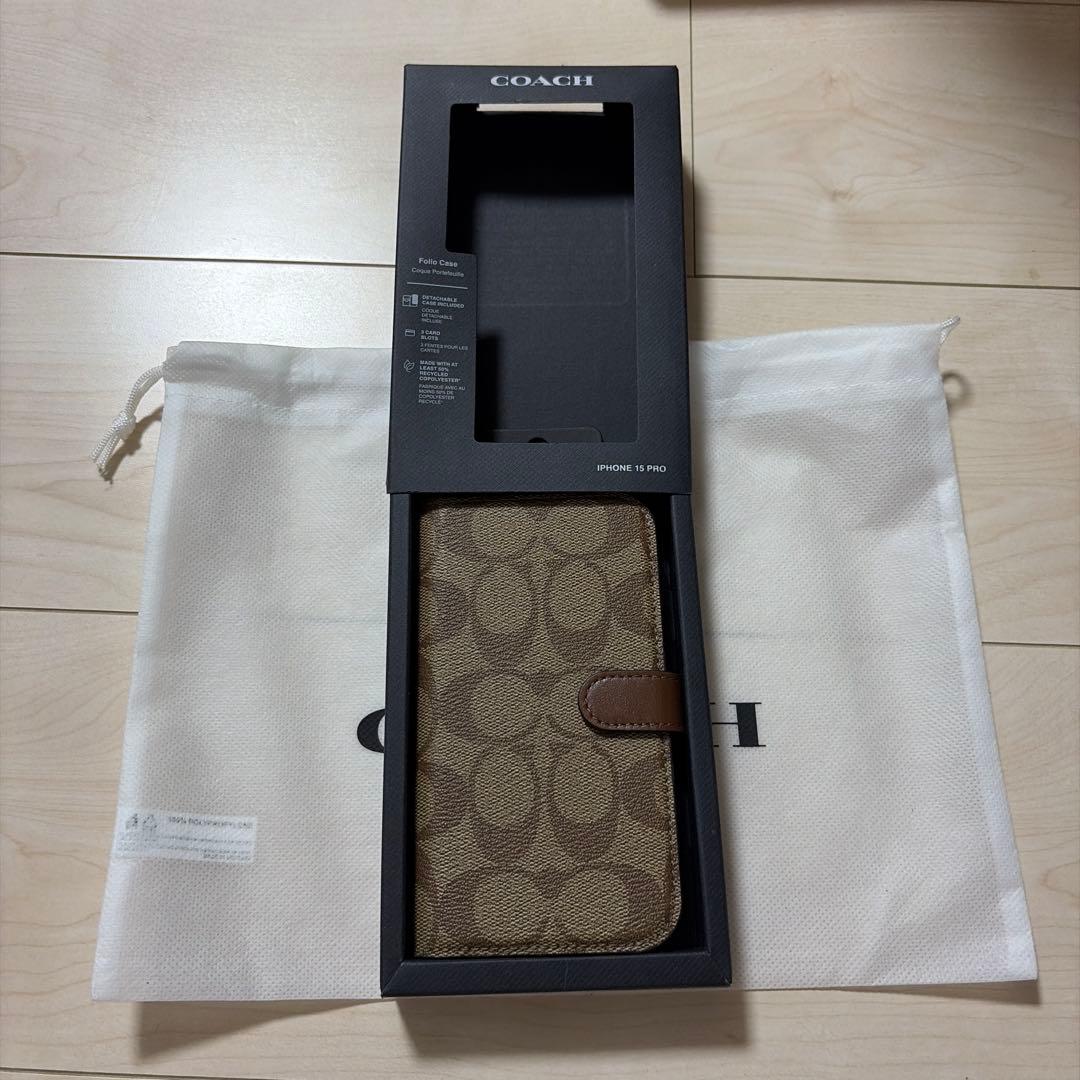コーチiPhone15 PRO ケース シグネチャー 手帳型 スマホケース 収納