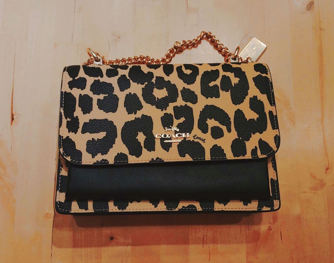 【新品・未使用】COACH ヒョウ柄 クラッチバッグ 保存袋付き
