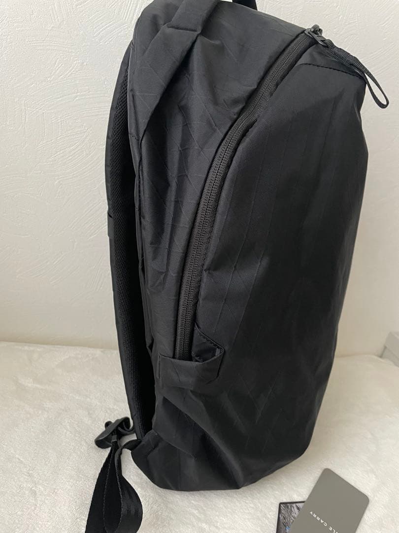 バッグ ABLE CARRY Thirteen Daybag X-Pac