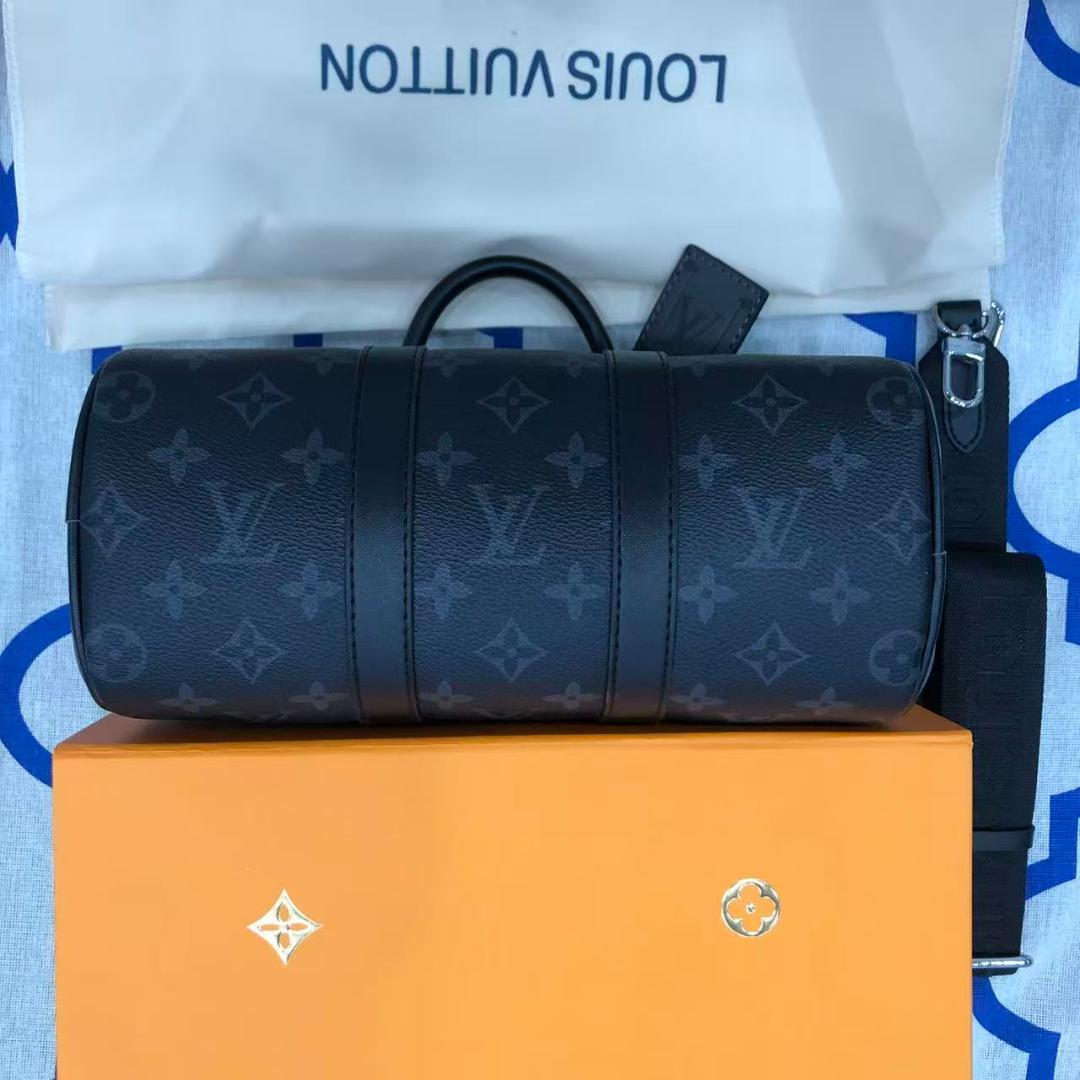 モンクレールブラックのフード付きダウンジャケット