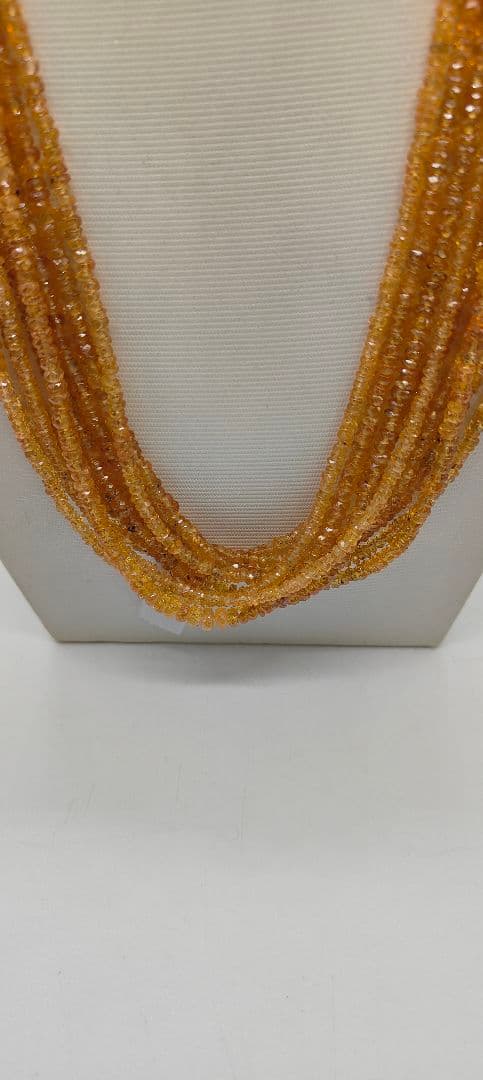 1823. スペサルタイトガーネットボタンカット9本連売り